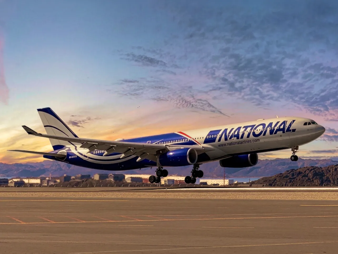 An airplane taking off at dusk