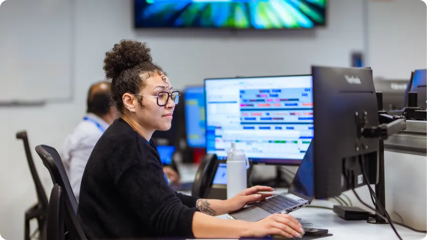 A person monitoring a screen